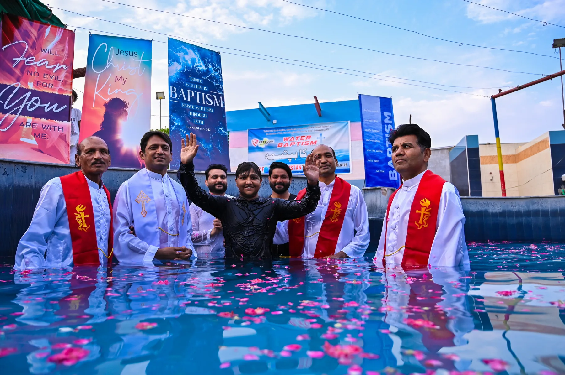 Church members celebrating baptism together