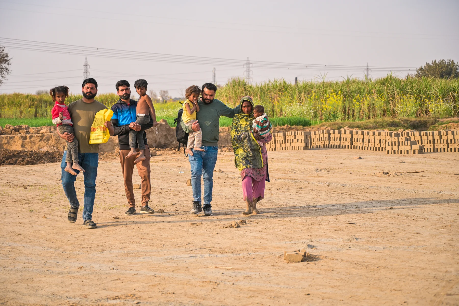The ministry team walking alongside a family outdoors