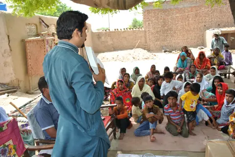 Holy Bible distribution & village fellowship