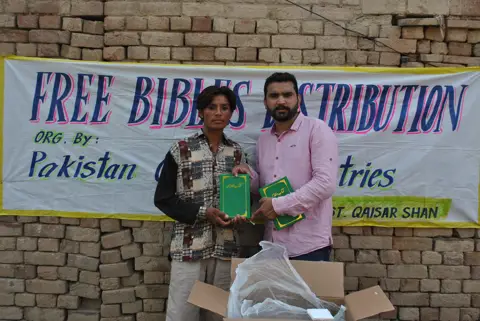 Holy Bible distribution & village fellowship