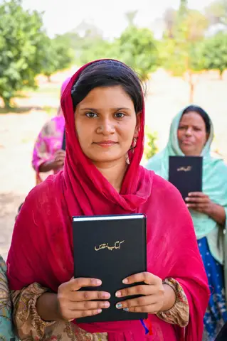 Holy Bible distribution & village fellowship